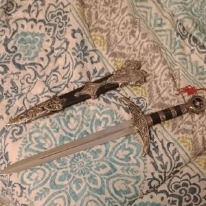 Intricately Designed Silver and Black Decorative Dagger